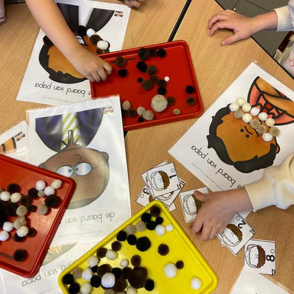 de baard van papa met pompons